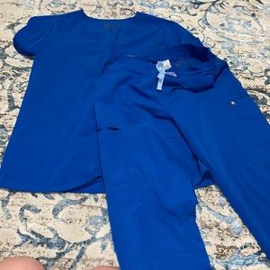 Figs scrubs. Medium top. Small bottoms.